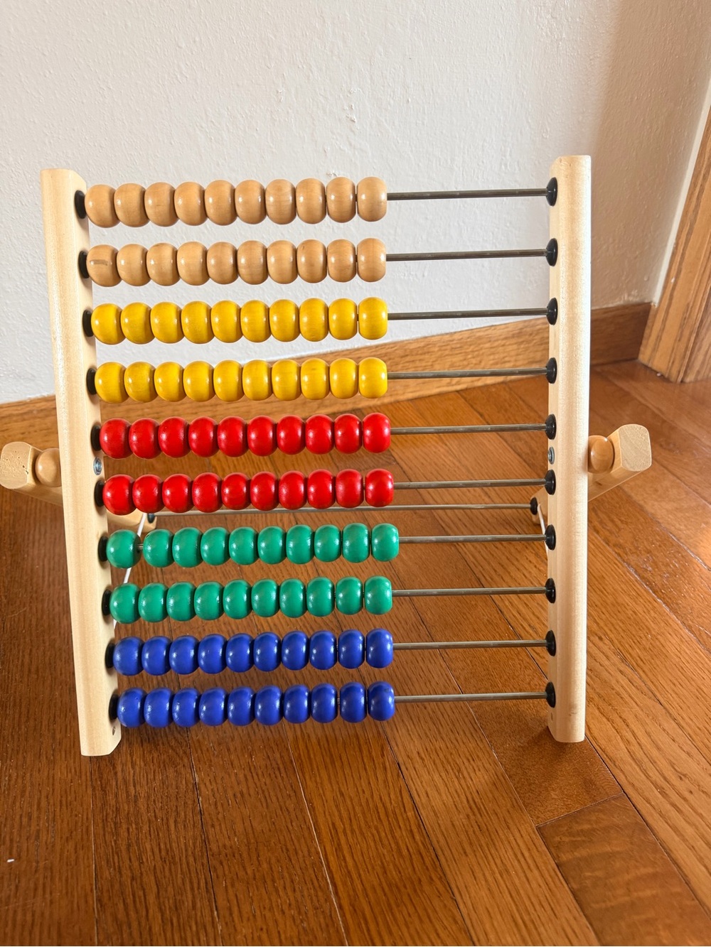 IKEA UNDERHÅLLA wooden abacus featuring 100 multicolored beads